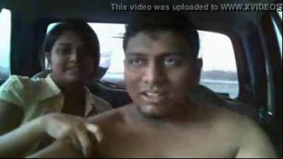 Couple having sex in car